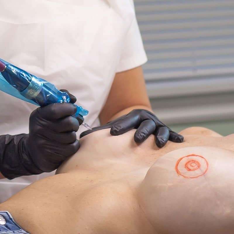 Areola restoration tattoo procedure performed on a client