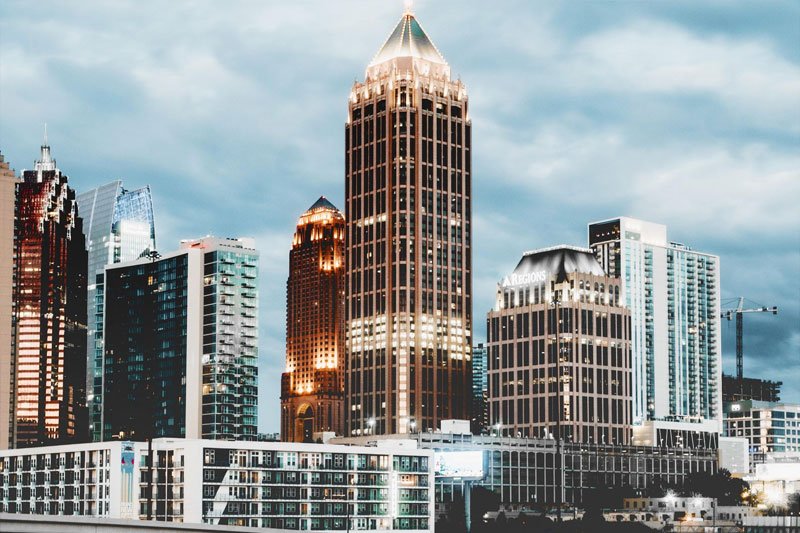 Atlanta city skyline at dusk where the permanent cosmetics studio is based